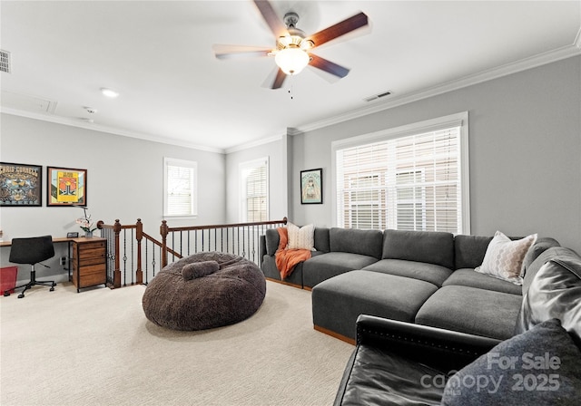 living room with visible vents, carpet, and ornamental molding