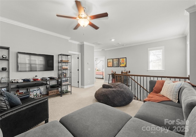 living room with carpet flooring, baseboards, and ornamental molding