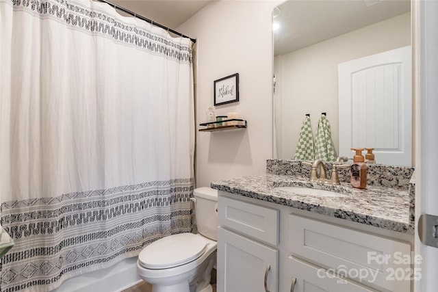 full bath with toilet and vanity