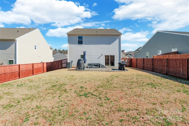 rear view of property with central air condition unit, a fenced backyard, a patio, and a yard