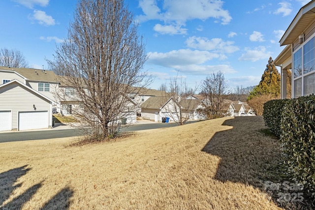 view of yard with a residential view