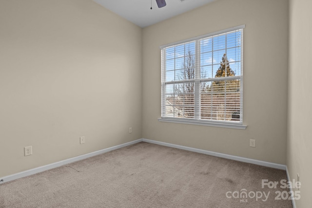 empty room with baseboards, carpet floors, and a healthy amount of sunlight