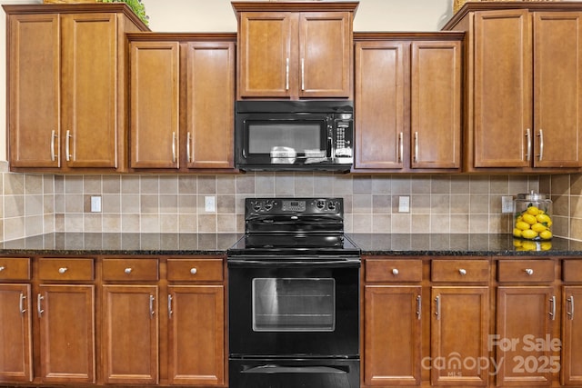 kitchen featuring decorative backsplash, dark stone counters, brown cabinets, and black appliances