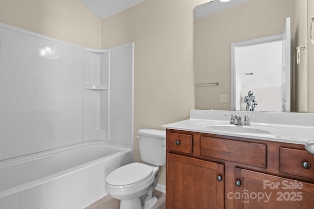 full bathroom featuring toilet, tile patterned flooring, washtub / shower combination, and vanity