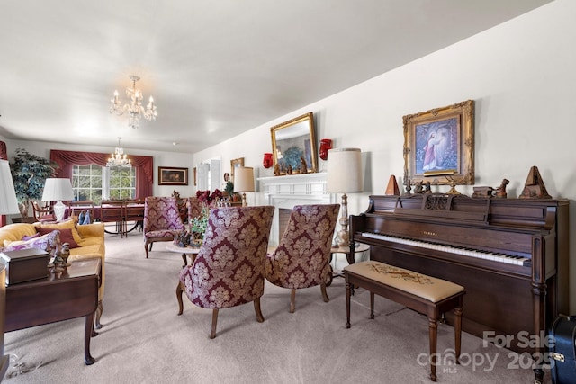 living room with light carpet, a fireplace, and an inviting chandelier