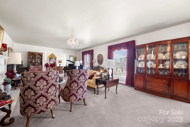 living area featuring light carpet and an inviting chandelier