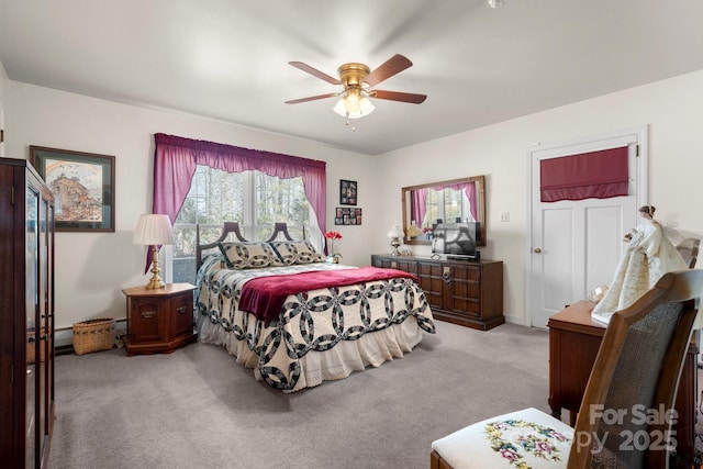 bedroom with light carpet and ceiling fan