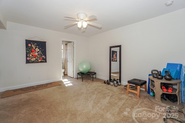 miscellaneous room featuring ceiling fan, carpet flooring, and baseboards