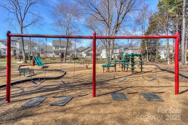 community jungle gym featuring a residential view