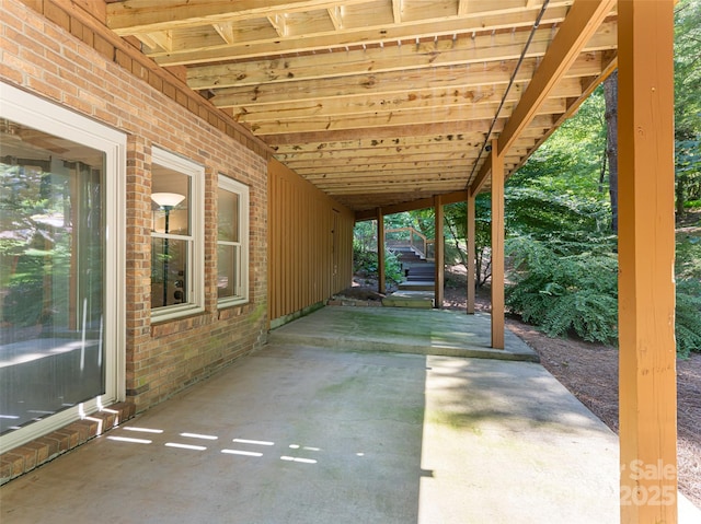 view of patio / terrace featuring stairway