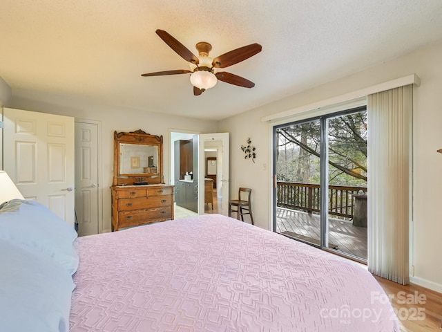 bedroom with ceiling fan, a textured ceiling, light wood-type flooring, and access to exterior