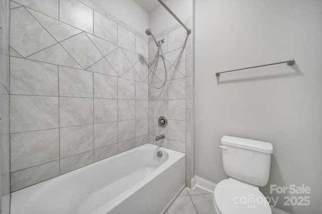 full bath featuring toilet, shower / bathtub combination, baseboards, and tile patterned floors