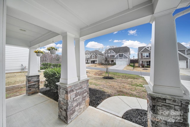 view of patio featuring a residential view and covered porch