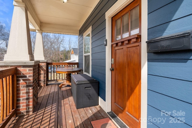 wooden deck with a porch