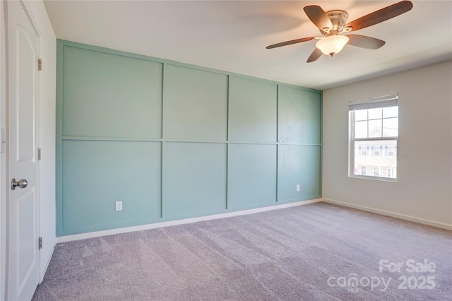 unfurnished bedroom featuring a closet, carpet floors, baseboards, and ceiling fan