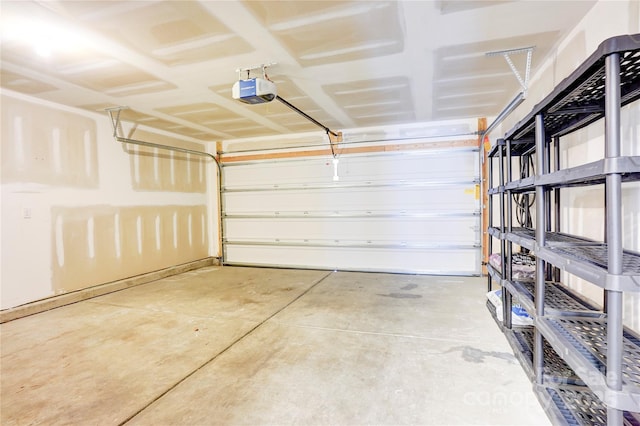 garage featuring a garage door opener