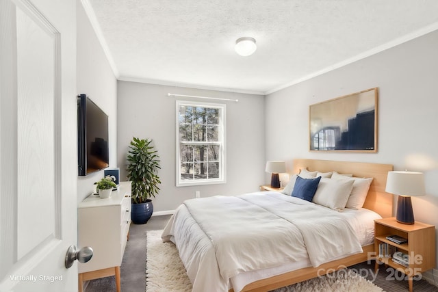 bedroom with carpet, crown molding, baseboards, and a textured ceiling