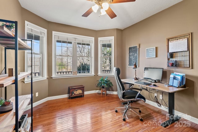 office featuring wood-type flooring and baseboards