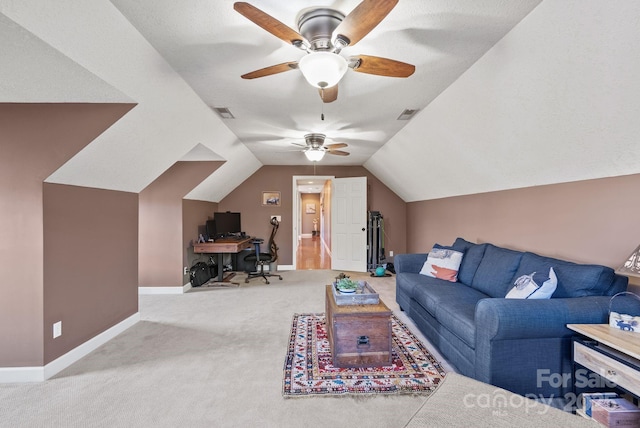 living area featuring lofted ceiling, visible vents, baseboards, and carpet flooring