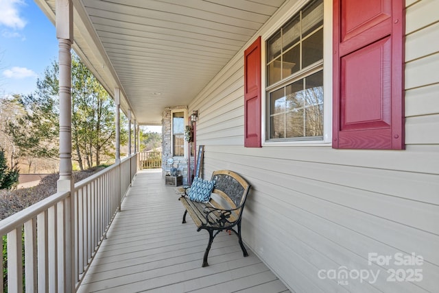 deck featuring a porch