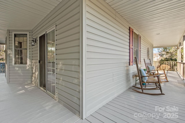 wooden deck with a porch