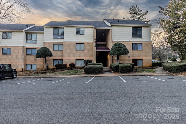 4814 Spring Lake Dr E, Charlotte, NC 28212 - property at dusk with uncovered parking
