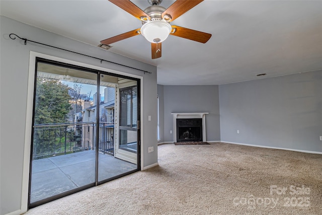 4814 Spring Lake Dr E, Charlotte, NC 28212 - unfurnished living room with carpet, visible vents, baseboards, and a fireplace with raised hearth