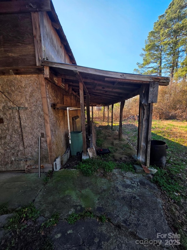 exterior space featuring an outbuilding