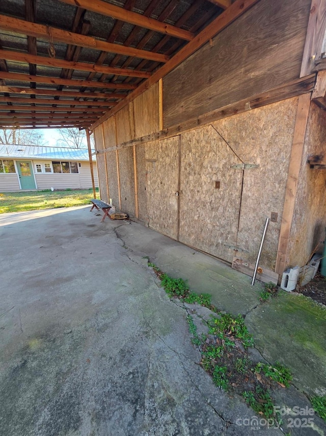 exterior space featuring a carport