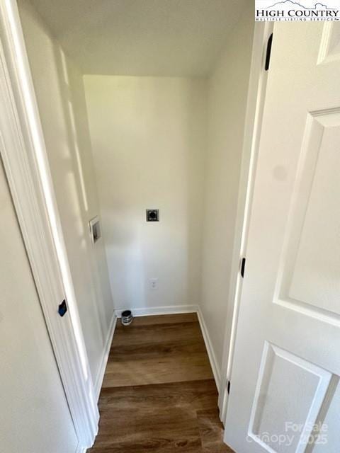 laundry room featuring dark wood-style floors, laundry area, baseboards, and hookup for an electric dryer