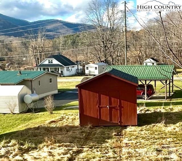 view of shed with a mountain view