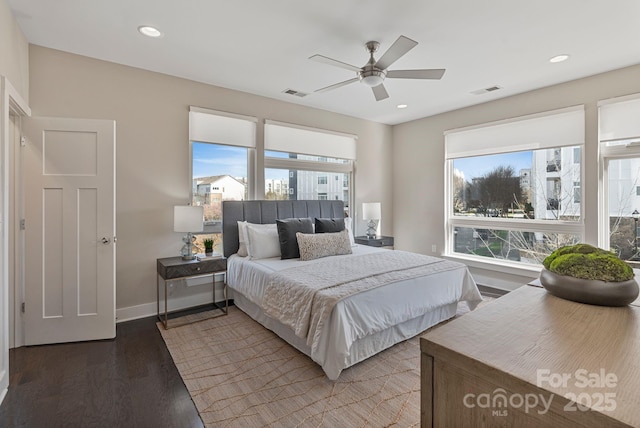 bedroom with recessed lighting, visible vents, and wood finished floors