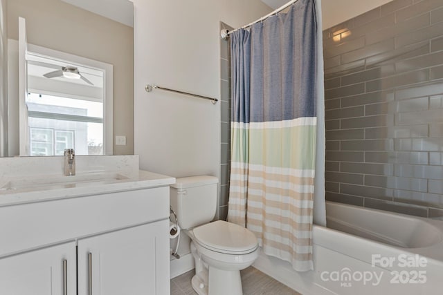 bathroom with toilet, shower / bath combo, a ceiling fan, and vanity