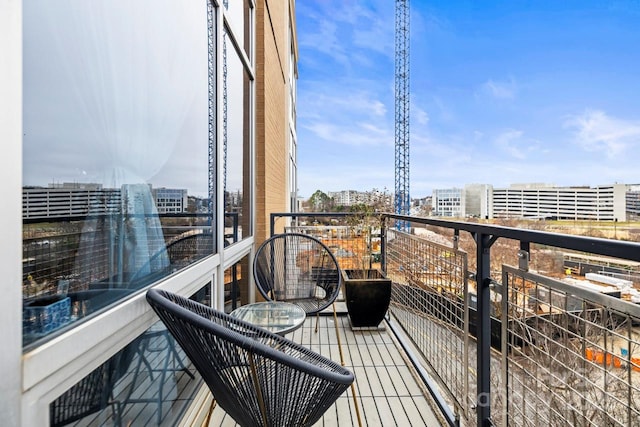 balcony featuring a view of city