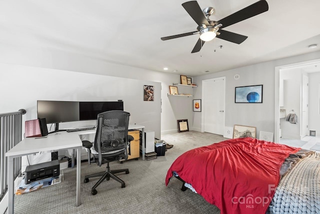 carpeted bedroom featuring a ceiling fan and baseboards