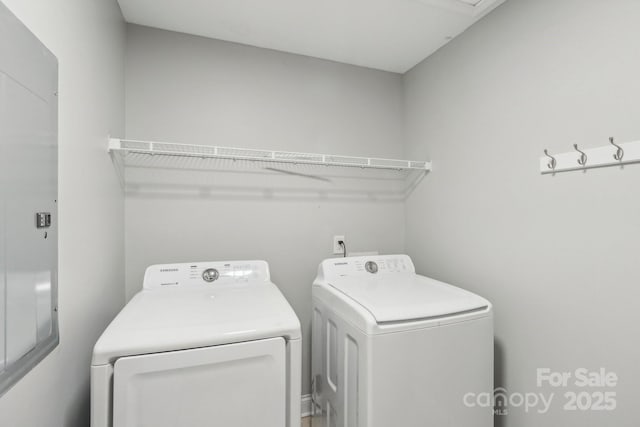 clothes washing area with laundry area and independent washer and dryer