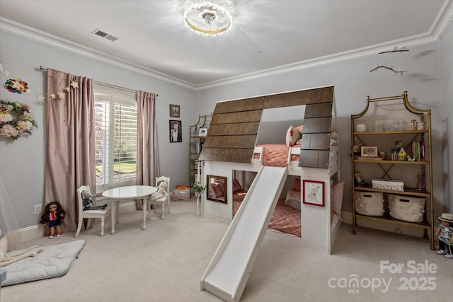 bedroom with visible vents, light colored carpet, and ornamental molding