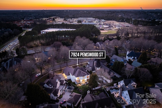 birds eye view of property with a residential view