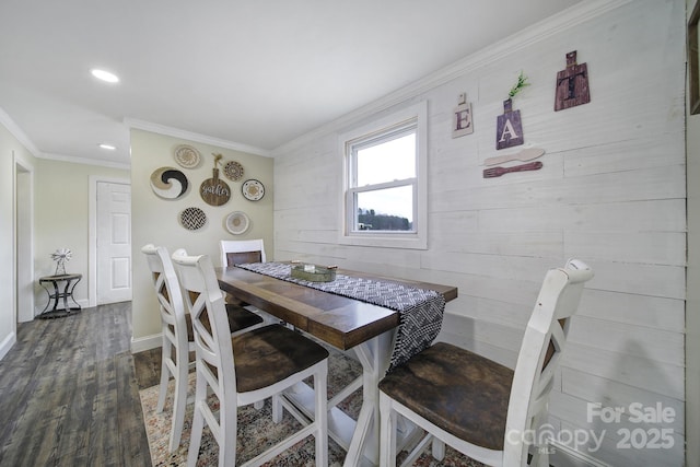 dining room with baseboards, ornamental molding, dark wood-style flooring, and recessed lighting