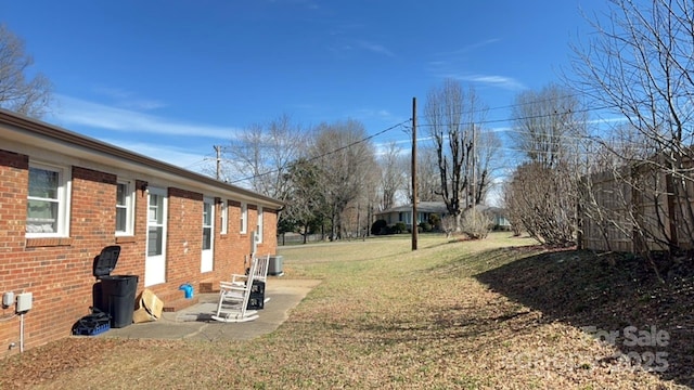 view of yard with central AC