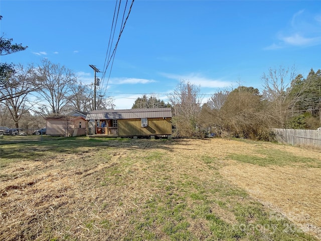 view of yard with fence