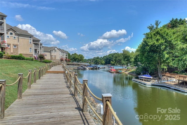 dock area featuring a water view