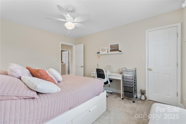 bedroom featuring light carpet and ceiling fan