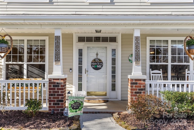 property entrance with a porch