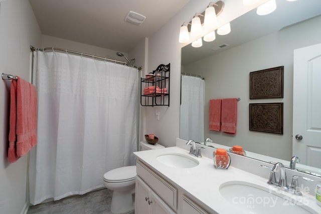 126 W Morehouse Ave, Mooresville, NC 28117 - bathroom with visible vents, a sink, toilet, and double vanity