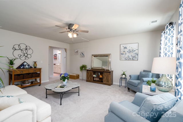 126 W Morehouse Ave, Mooresville, NC 28117 - carpeted living room featuring attic access, baseboards, visible vents, and a ceiling fan