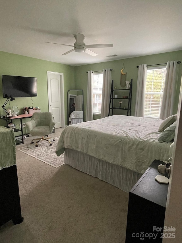 126 W Morehouse Ave, Mooresville, NC 28117 - bedroom featuring carpet floors, multiple windows, ceiling fan, and visible vents