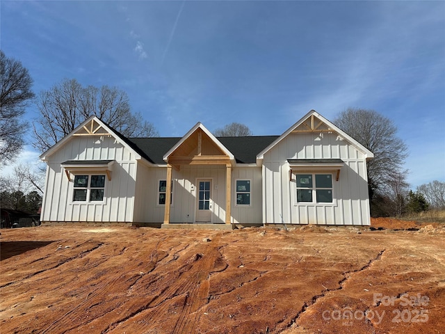 modern farmhouse style home with board and batten siding