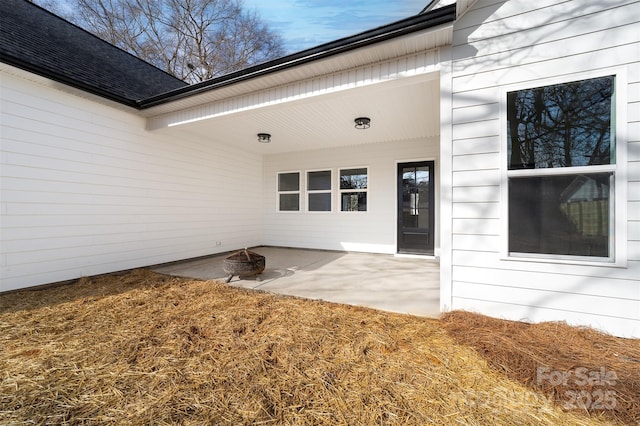 doorway to property with a patio