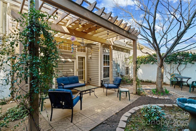 view of patio / terrace with an outdoor hangout area, fence, and a pergola